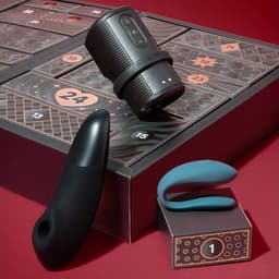 Erotische adventskalender 2026 voor volwassenen en koppels - Luxury - Lovehoney x Womanizer - 24 sensuele verrassingen - Womanizer Enhance, verbonden We-Vibe Sync Lite, Arcwave Zing - seksspeeltjes voor hem en haar - ondeugend kerstcadeau — thumbnail 2