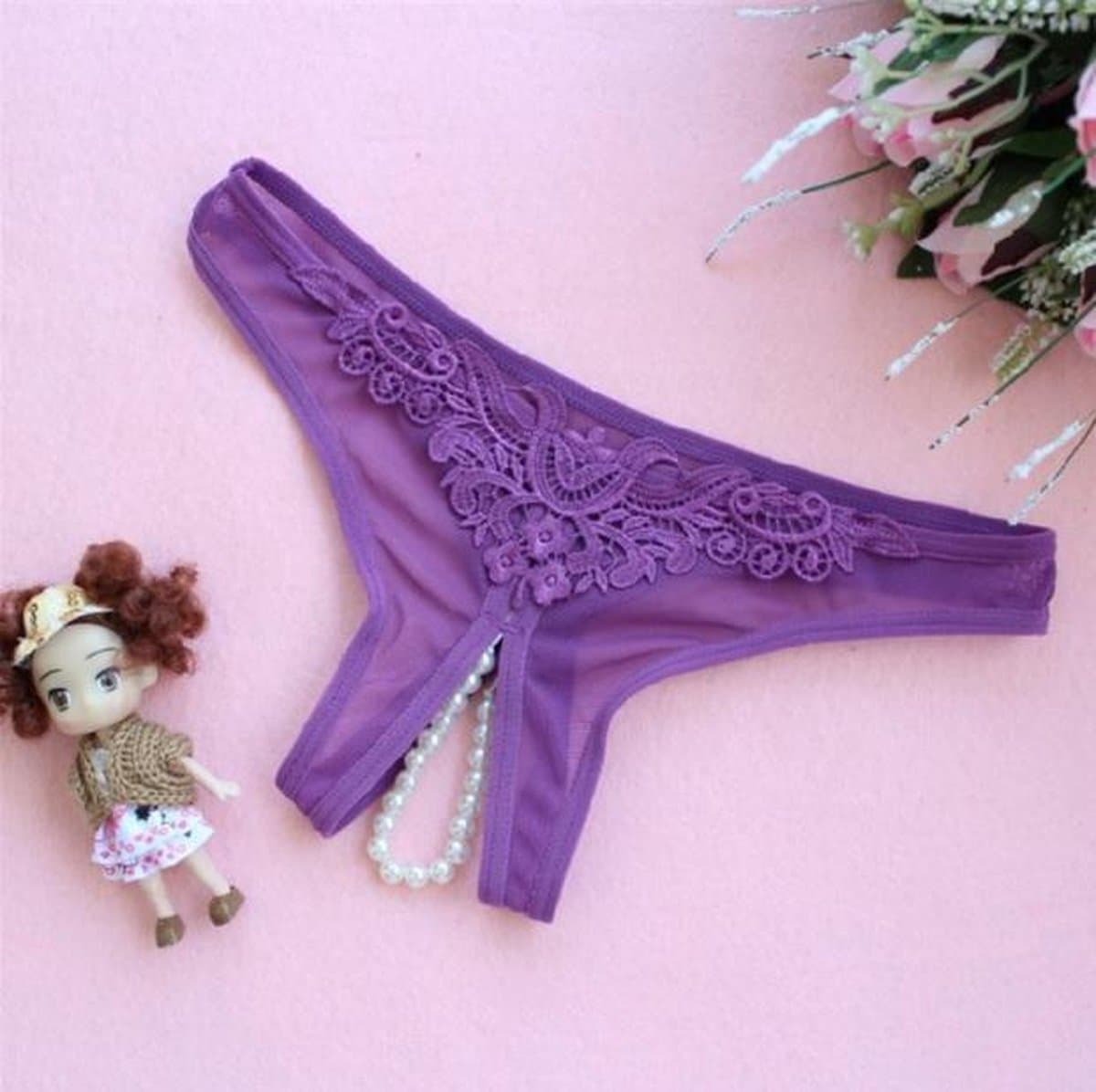 Paarse string met parels — afbeelding 1